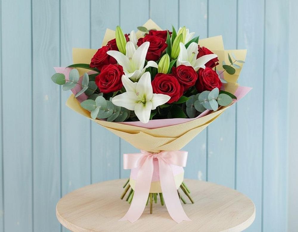 Букет цветов из: Лилии и Розы в Каргате